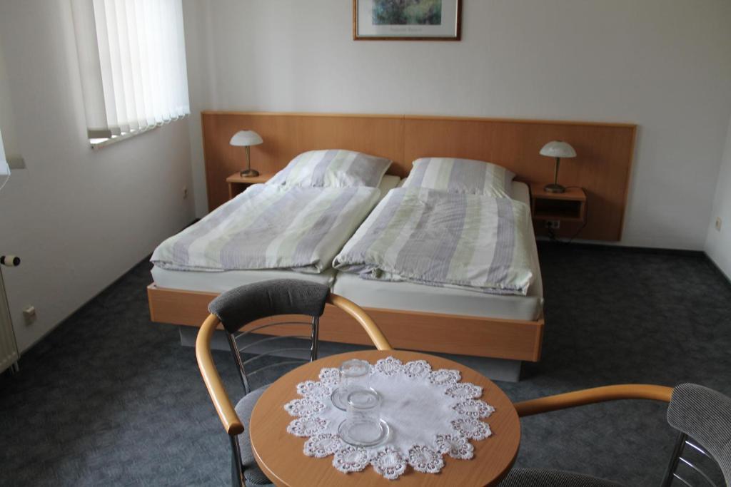 Hotel Am Stadtwall Кведлінбург Номер фото